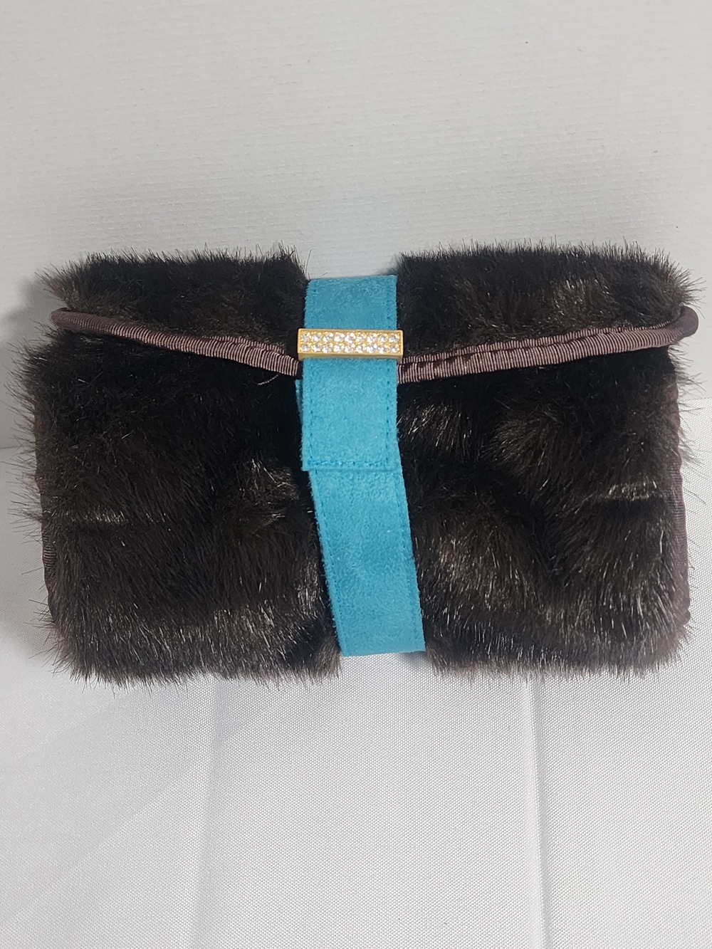 Stephanie Johnson faux fur rhinestone makeup roll-up travel case bag.